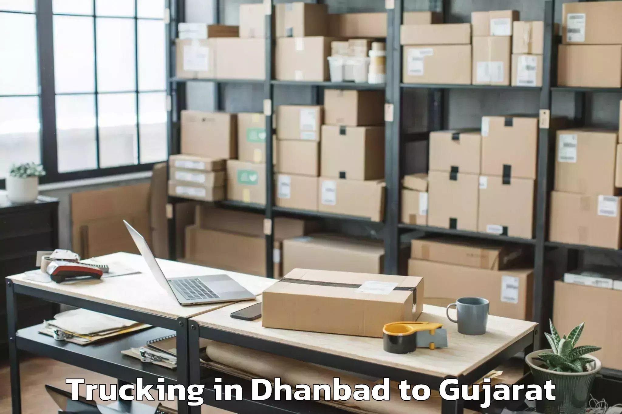 Hassle-Free Dhanbad to Adalaj Trucking